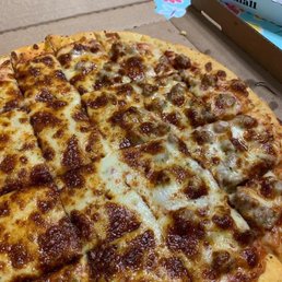 Thin crust, half sausage, half pepperoni (hidden under all that cheese). Thin crust, half sausage, half pepperoni (hidden under all that cheese).