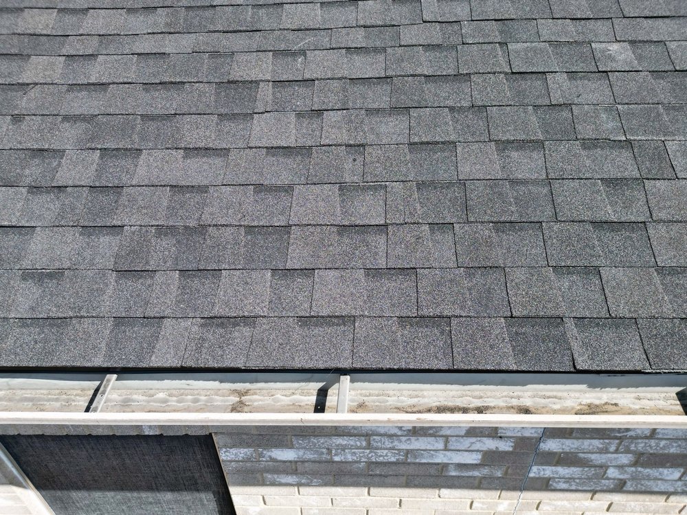 Slide of Whatley Roofing