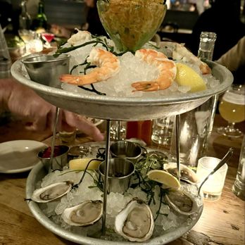 The Smith - THE ROYALE - eight oysters, six chilled shrimp, spicy salmon tartare - New American Near Me - New York, New York The Smith - THE ROYALE - eight oysters, six chilled shrimp, spicy salmon tartare - New American Near Me - New York, New York