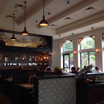 The Osprey - Great seating options throughout with a bounty of natural light! - Seafood Near Me - Orlando, Florida The Osprey - Great seating options throughout with a bounty of natural light! - Seafood Near Me - Orlando, Florida