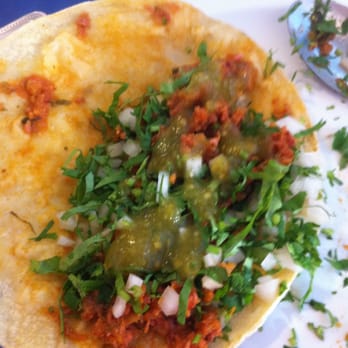 Mar Y Mar - Marlin taco after adding onions and cilantro... - Mexican Near Me - San Bruno, California