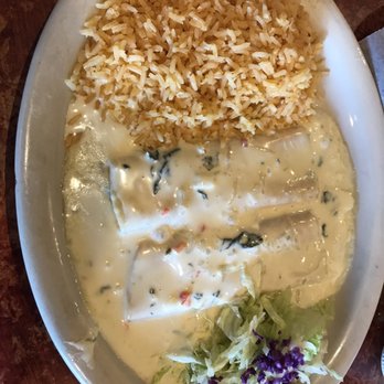 Gecko Grill - Cheese enchiladas with spinach cheese sauce and rice - Mexican Near Me - Gilbert, Arizona Gecko Grill - Cheese enchiladas with spinach cheese sauce and rice - Mexican Near Me - Gilbert, Arizona