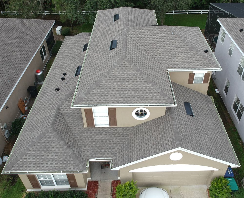 Slide of One World Roofing