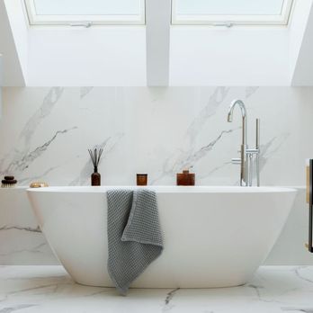 We Reno Bath - a modern bathroom with a skylight - Plumbing Near Me - Richmond Hill, Ontario We Reno Bath - a modern bathroom with a skylight - Plumbing Near Me - Richmond Hill, Ontario