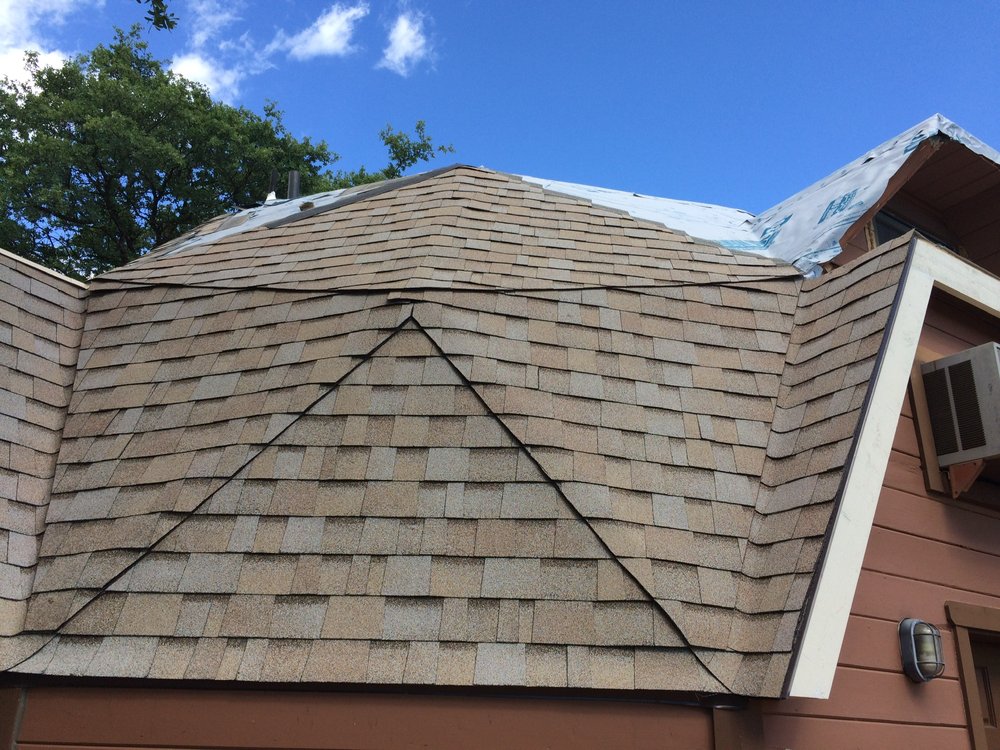 Slide of Mountain Roofing Systems