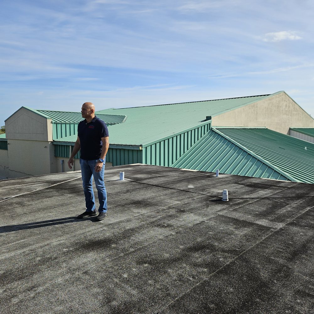 Slide of Metal Roofing Contractor