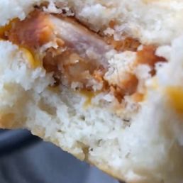 ows a half eaten sandwich