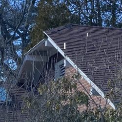 Midcoast Woodworkers - top front eve(?) w/shingles off.  leaks