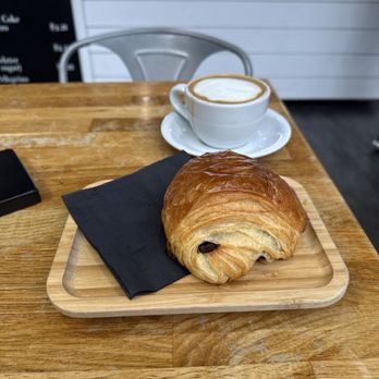 La Parisienne French Bakery - Pain au Chocolat & Cappucino - 8oz. - Cafes Near Me - Seattle, Washington La Parisienne French Bakery - Pain au Chocolat & Cappucino - 8oz. - Cafes Near Me - Seattle, Washington