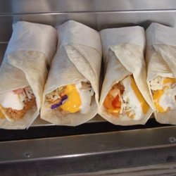 Los Burritos de Meche - Order ready to hit the plates.