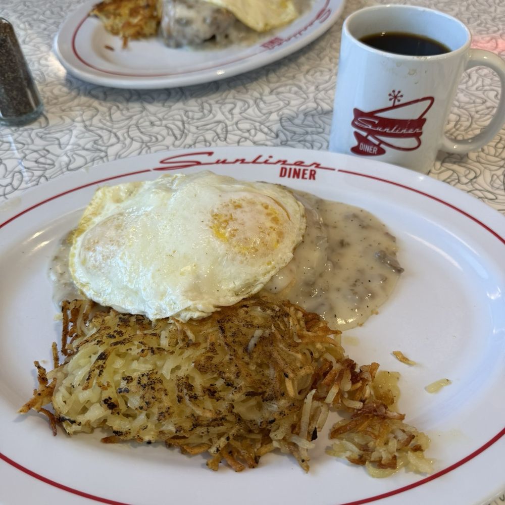 Sunliner Diner - Biscuits and gravy with fried eggs and crispy hash browns. - Diners Near Me - Orange Beach, Alabama Sunliner Diner - Biscuits and gravy with fried eggs and crispy hash browns. - Diners Near Me - Orange Beach, Alabama
