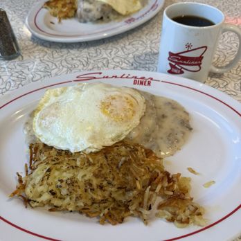 Sunliner Diner - Biscuits and gravy with fried eggs and crispy hash browns. - Diners Near Me - Orange Beach, Alabama Sunliner Diner - Biscuits and gravy with fried eggs and crispy hash browns. - Diners Near Me - Orange Beach, Alabama