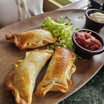 Bayside Cafe - Argentinian empinadas! Light crispy and FLVORFUL! - Breakfast & Brunch Near Me - Panama City Beach, Florida Bayside Cafe - Argentinian empinadas! Light crispy and FLVORFUL! - Breakfast & Brunch Near Me - Panama City Beach, Florida