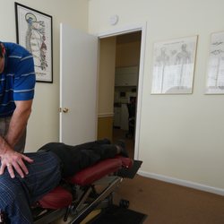 Mirando Chiropractic Center - Dr. Mirando gives a chiropractic adjustment