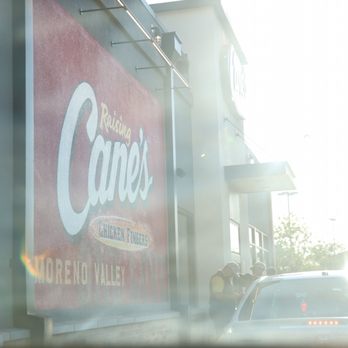 Raising Cane’s - Drive-Thru during a sunny summer day - Chicken Shop Near Me - Moreno Valley, California Raising Cane’s - Drive-Thru during a sunny summer day - Chicken Shop Near Me - Moreno Valley, California