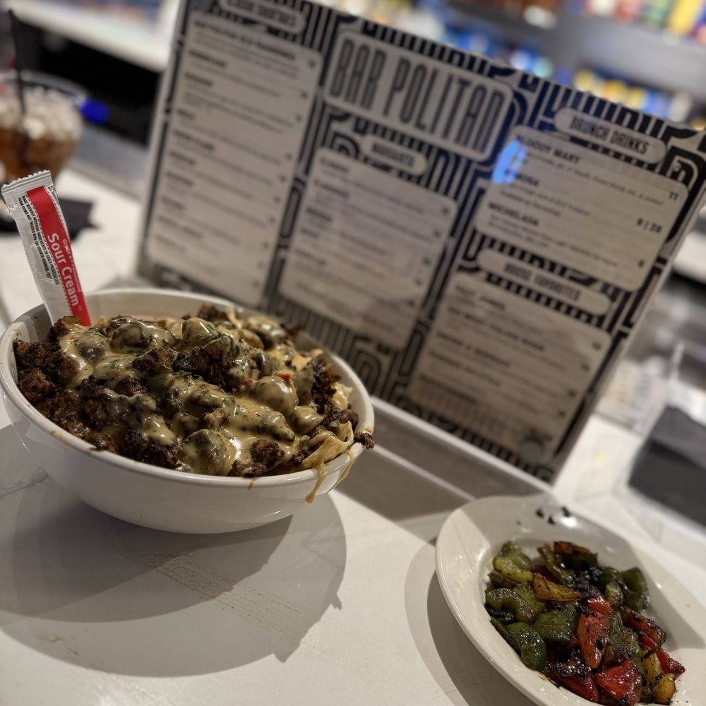 Politan Row - Jerk chicken nachos - Venues & Event Spaces Near Me - Dunwoody, Georgia Politan Row - Jerk chicken nachos - Venues & Event Spaces Near Me - Dunwoody, Georgia