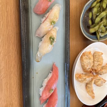 Momo Sushi - Assorted sushi and gyoza in the background to satisfy all types of tastebuds - Sushi Bars Near Me - Riverside, California Momo Sushi - Assorted sushi and gyoza in the background to satisfy all types of tastebuds - Sushi Bars Near Me - Riverside, California