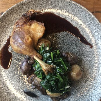 Norman Rose Tavern - Duck confit with roasted potatoes and spinach. The sauce was outstanding! - New American Near Me - Napa, California Norman Rose Tavern - Duck confit with roasted potatoes and spinach. The sauce was outstanding! - New American Near Me - Napa, California