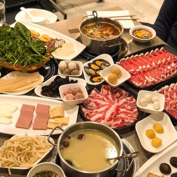 Happy Lamb Hot Pot - a table full of food - Mongolian Near Me - Toronto, Ontario Happy Lamb Hot Pot - a table full of food - Mongolian Near Me - Toronto, Ontario