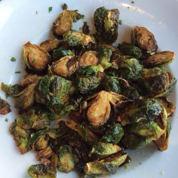 Simmzy's - Brussels sprouts: tasty, crispy, buttery, garlicky, lemony with capers. - Gastropubs Near Me - Long Beach, California Simmzy's - Brussels sprouts: tasty, crispy, buttery, garlicky, lemony with capers. - Gastropubs Near Me - Long Beach, California