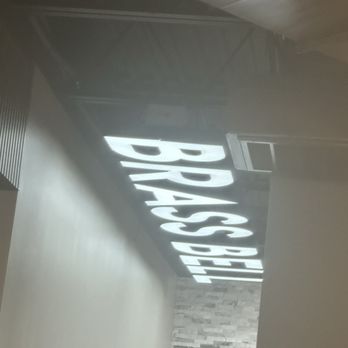 Prime 757 Steakhouse and Grill - The old brass bell sign is actually used as lightning near the bathroom - Seafood Near Me - Virginia Beach, Virginia Prime 757 Steakhouse and Grill - The old brass bell sign is actually used as lightning near the bathroom - Seafood Near Me - Virginia Beach, Virginia