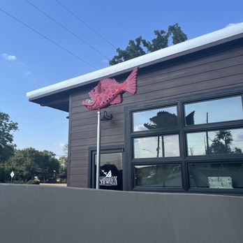 Shipwreck Grill - This guy spins around - Seafood Near Me - Bryan, Texas