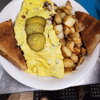 Hometown Eatery - an omelet and potatoes on a plate - Breakfast & Brunch Near Me - North Rose, New York Hometown Eatery - an omelet and potatoes on a plate - Breakfast & Brunch Near Me - North Rose, New York