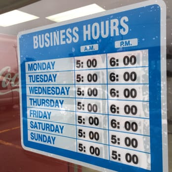 Champagne's Bakery - a business hours sign - Bakeries Near Me - Breaux Bridge, Louisiana
