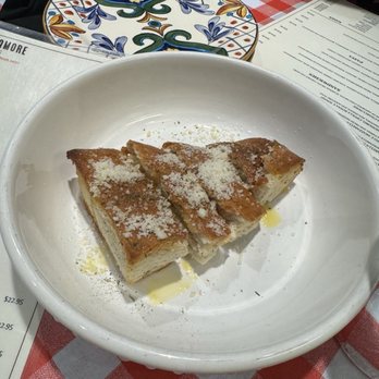 Pane E Amore Italian Cafe - Warm bread at the table while you wait. - Cafes Near Me - Bradenton Beach, Florida