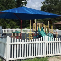 Oak Grove Preschool and Kindergarten - Our playground, complete with a sun shade for hot days!