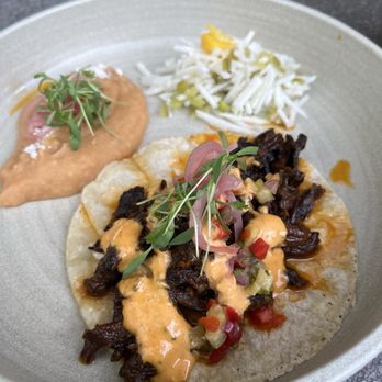 Gertrude's - Mushroom taco with pickled red shallots, jicama-citrus slaw, and smokey white bean puree. - New American Near Me - Phoenix, Arizona Gertrude's - Mushroom taco with pickled red shallots, jicama-citrus slaw, and smokey white bean puree. - New American Near Me - Phoenix, Arizona