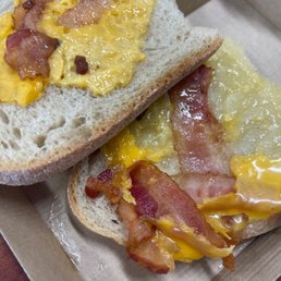  a bacon and egg sandwich in a box