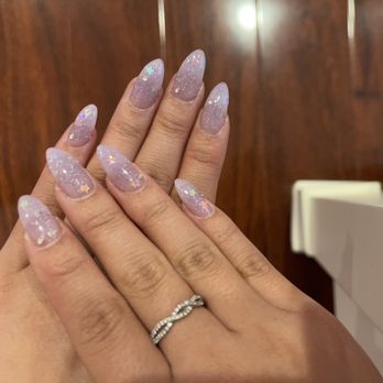 Holly’s Nails - almond nails: iridescent purple acrylic with holographic stars and silver crystals - Nail Salons Near Me - Cypress, California