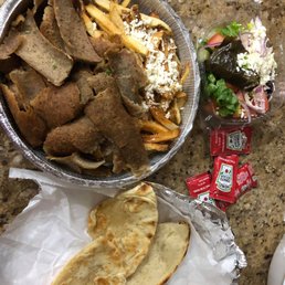 gyro platter that comes with truffle fries, greek salad, and pitta. A side of tzatziki was depressingly forgotten gyro platter that comes with truffle fries, greek salad, and pitta. A side of tzatziki was depressingly forgotten