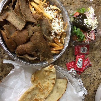 Kuzina - gyro platter that comes with truffle fries, greek salad, and pitta. A side of tzatziki was depressingly forgotten - Mediterranean Near Me - Staten Island, New York Kuzina - gyro platter that comes with truffle fries, greek salad, and pitta. A side of tzatziki was depressingly forgotten - Mediterranean Near Me - Staten Island, New York