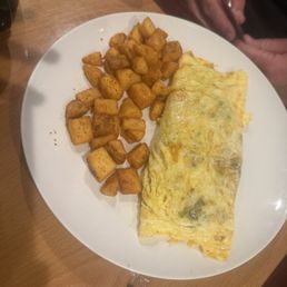 Omelet and home fries Omelet and home fries