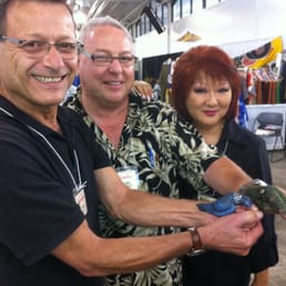 Elaine painted a ring necked dove and alligator on these hands.