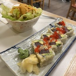 Tuna Avocado Roll with Tobiko and brown rice Tuna Avocado Roll with Tobiko and brown rice