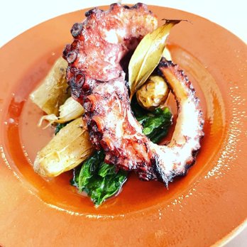 Petiscos - Grilled octopus with potatoes, garlic and spinach. - Portuguese Near Me - San Jose, California Petiscos - Grilled octopus with potatoes, garlic and spinach. - Portuguese Near Me - San Jose, California