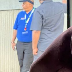 Dollar Car Rental-Dallas - Outside talking to someone else while we were waiting to be transported