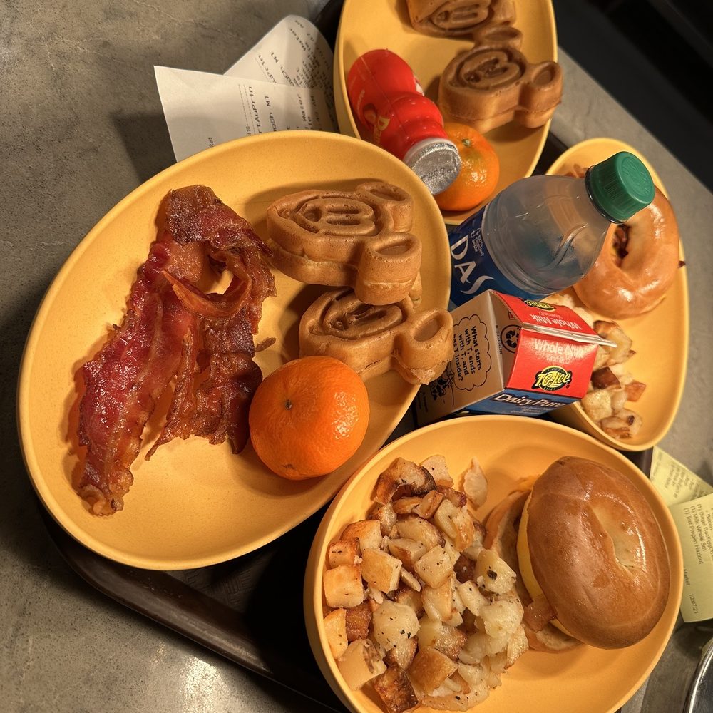 a variety of breakfast foods on a tray