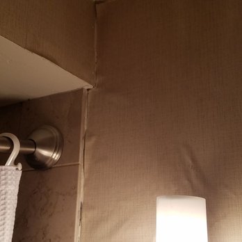 Humphreys Half Moon Inn - Peeled wallpaper in restroom - San Diego, CA