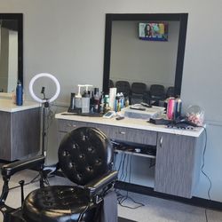 Trim and styles barbershop - Inside the shop. Our barber chairs