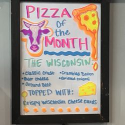 Burgers & Beer Bar and Grill - Burger special replaced by pizza special.