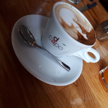 Da Capo - a cup of cappuccino on a saucer - Cafes Near Me - Edmonton, Alberta Da Capo - a cup of cappuccino on a saucer - Cafes Near Me - Edmonton, Alberta