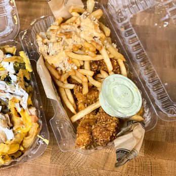 The Chicken Koop - To go: Regular chicken strips, garlic fries (upgrade), green sauce - New American Near Me - Whittier, California The Chicken Koop - To go: Regular chicken strips, garlic fries (upgrade), green sauce - New American Near Me - Whittier, California