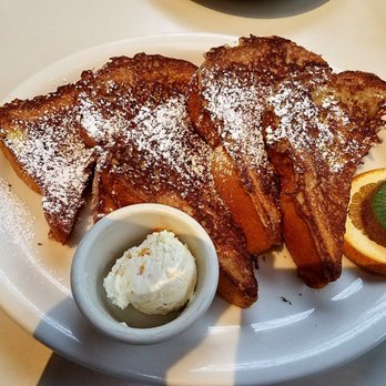 Half Day Cafe - Brioche French toast in coffee-Kahlua batter with orange butter. - Breakfast & Brunch Near Me - Kentfield, California