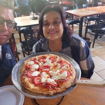 PizMo Cafe - Tuscany pizza. We added pepperoni, tomato, mozzarella cheese, basil. - Pizza Near Me - Pismo Beach, California