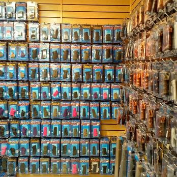 Hogue Grips - Wall of handgun grips... - Guns & Ammo Near Me - Paso Robles, California