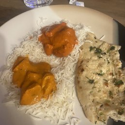 Ordered to go. Portion of butter chicken and tikka masala with garlic naan